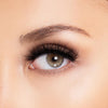Open eye close up image of woman wearing Emma strip lashes